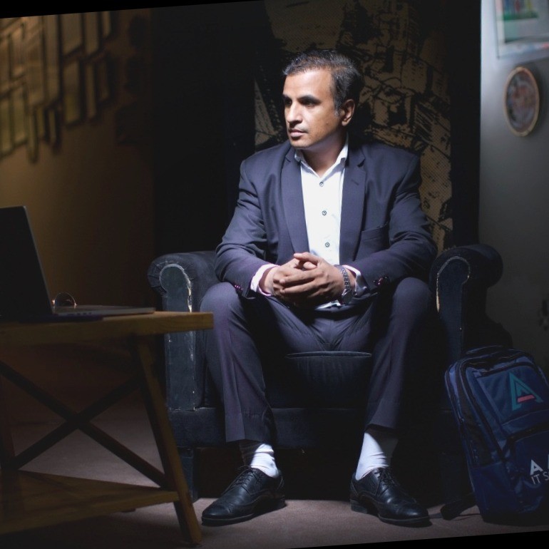 [headshot] image of satisfied student using a laptop